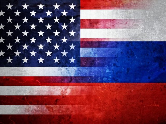 American and Russian flags merging